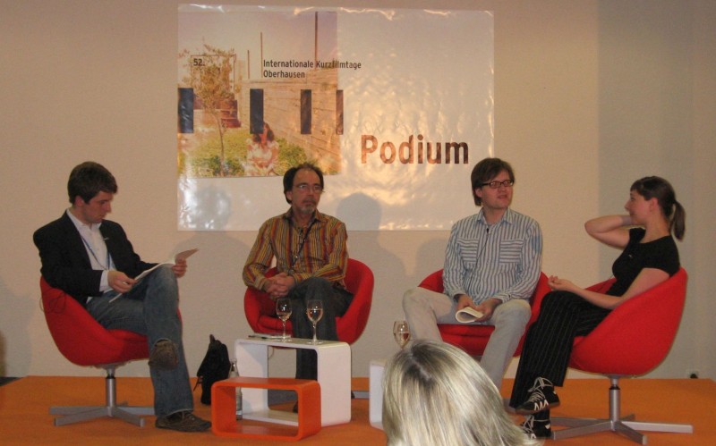 Michael Jahn, Reinhard W. Wolf, Daniel Kothenschulte and Christina Kaminski (left to right) present the short film study in Oberhausen.